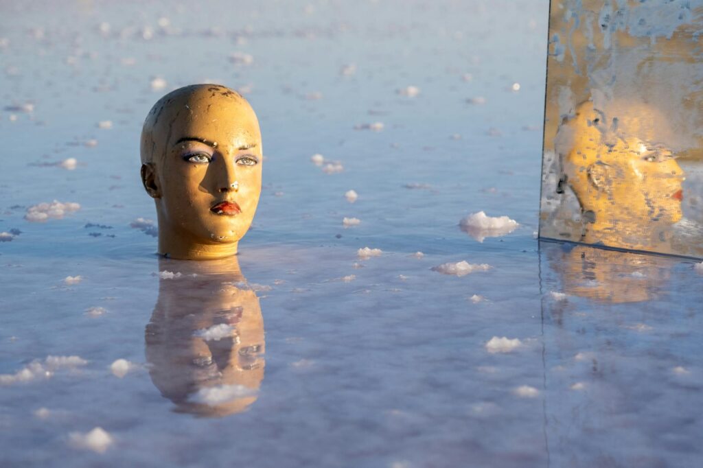 disneyland hiroshima protest doll ice cream magnate mystery 20250808015237125957